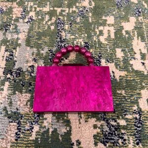 Elegant Pink Handbag with Beaded Handle